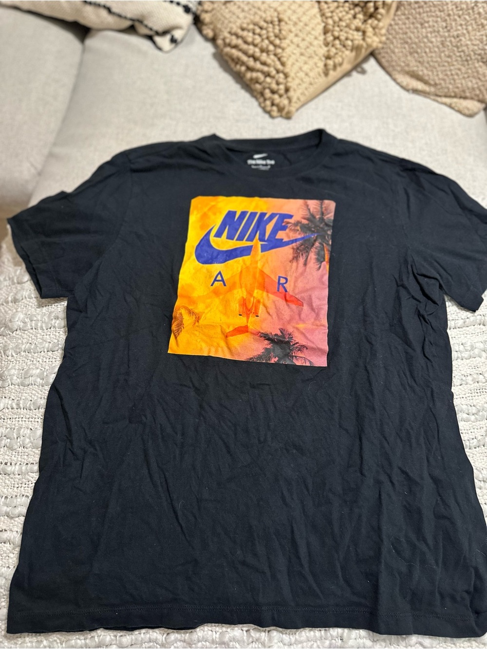 Nike Black Short Sleeve T-Shirt with Orange-to-Purple Gradient Graphic